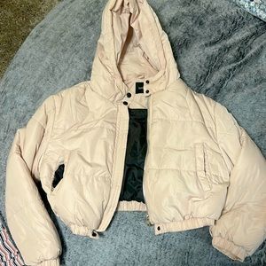 A Boohoo puffer jacket.